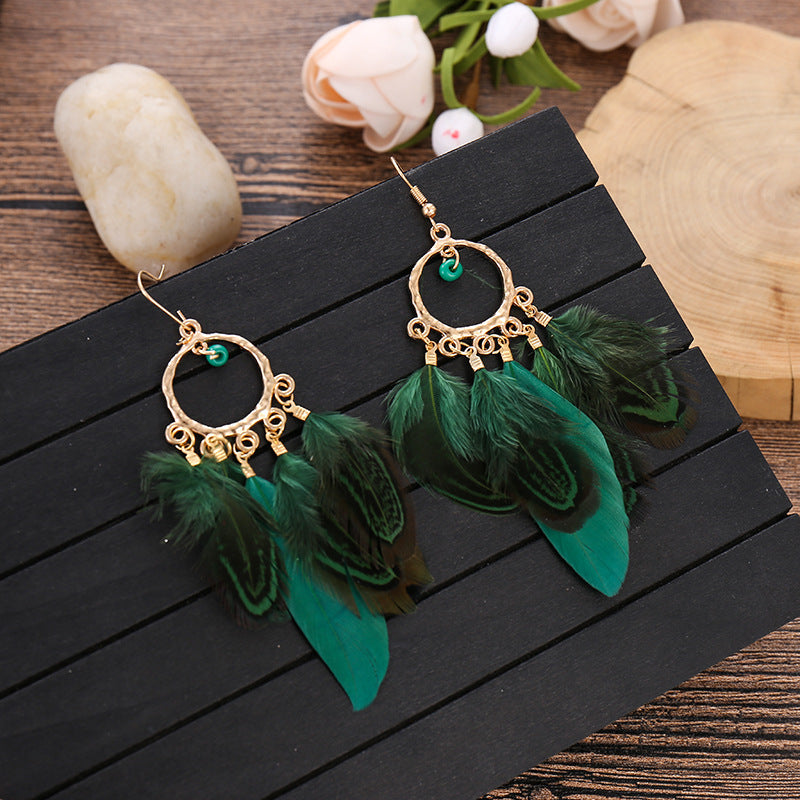 Chanel feather online earrings